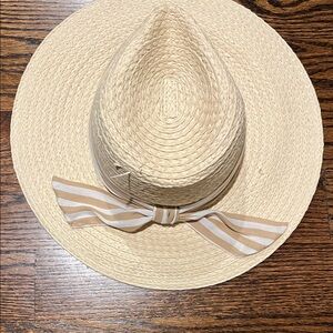 Adjustable straw hat with tan and white striped bow - unworn